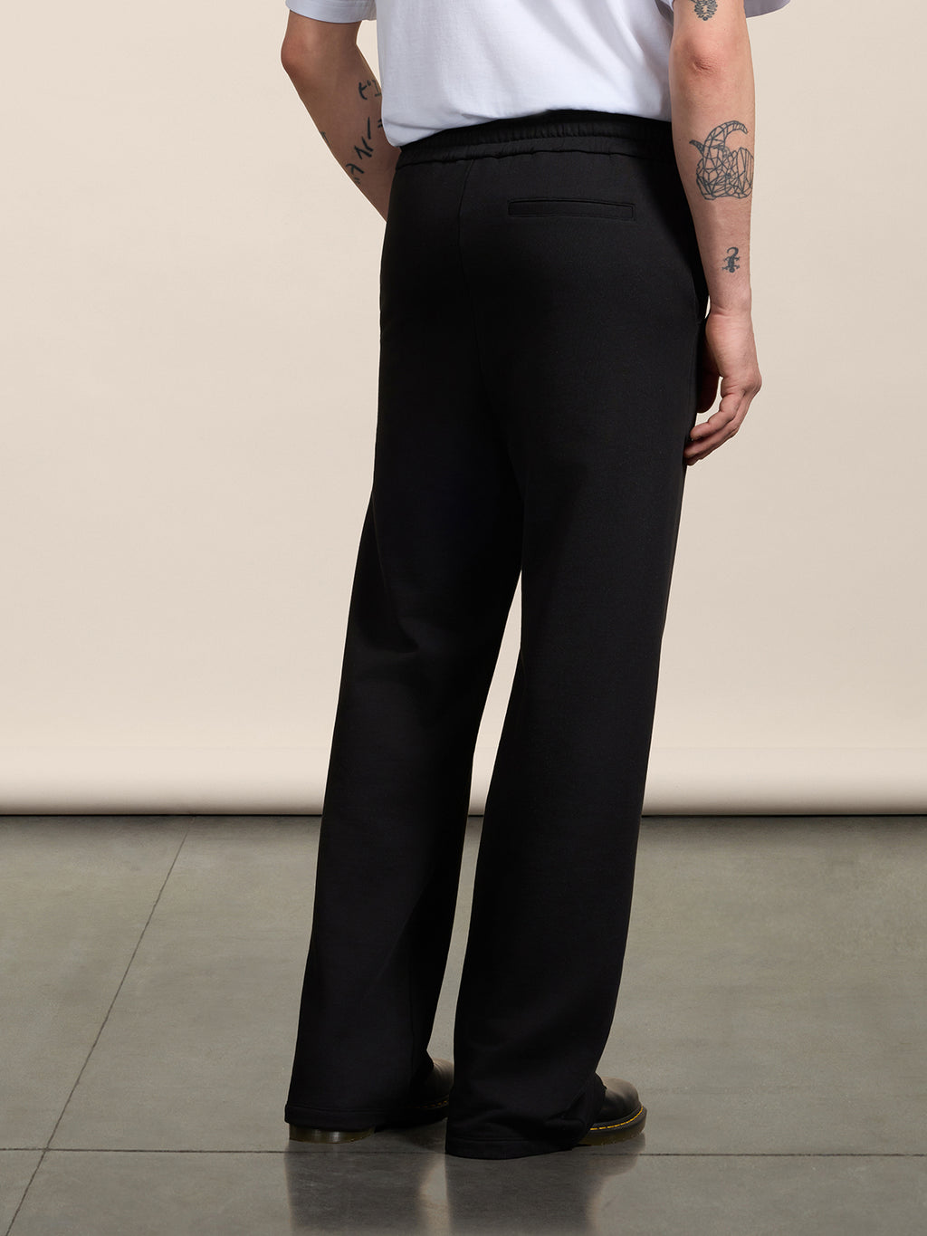 LOOSE-FIT TROUSERS IN BLACK COTTON FLEECE WITH EMBROIDERY - BLACK - Men′s Bottomwear | Pence 1979