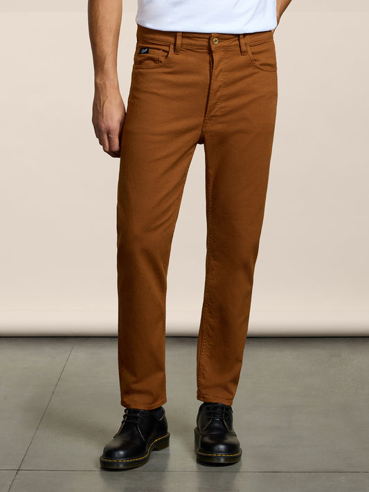 MEN'S 5 POCKET PANT IN COMFORT COTTON BULL FABRIC GARMENT DYED TOBACCO COLOR CARROT FIT - TOBACCO - Men′s Bottomwear | Pence 1979